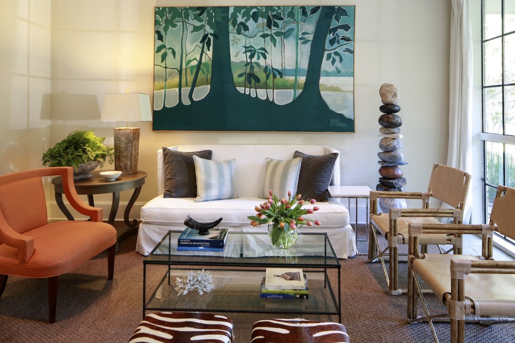 The living room is filled with conversation pieces, from one of the last Burts Cason lamps ever made to a painted marsh scene created for this space by Mississippi artist Terry Blake Edwards. 