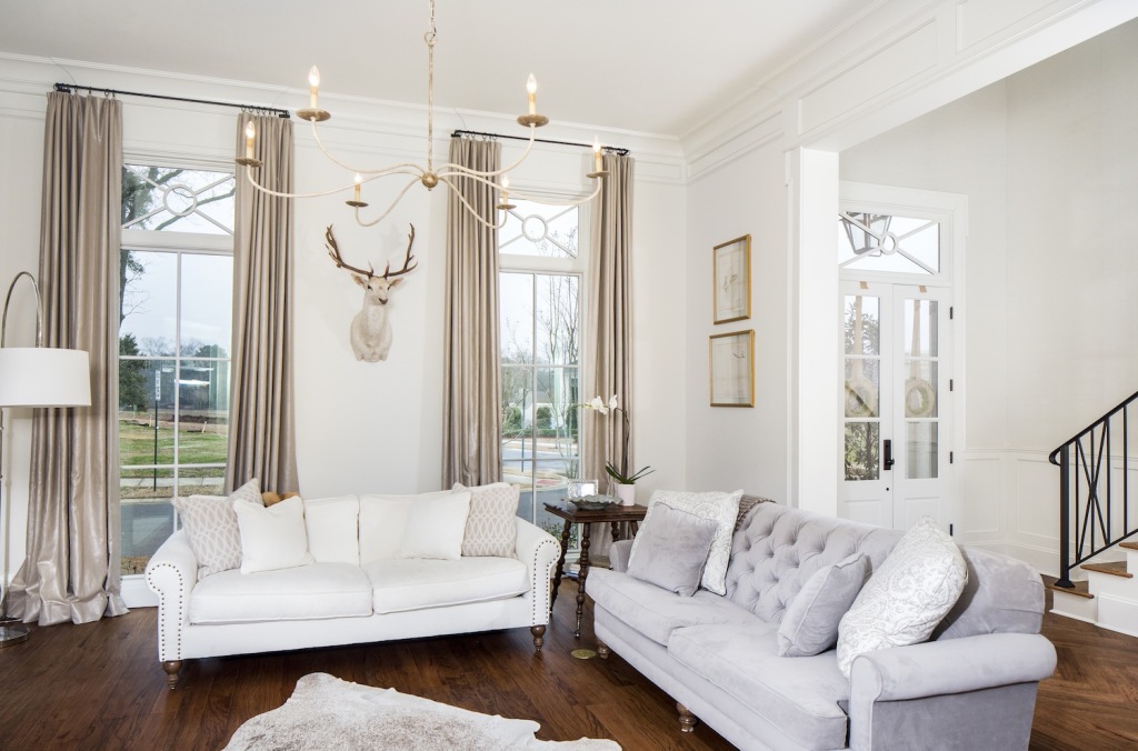 It’s a fortunate newlywed husband whose wife agrees to hang a hunting trophy on the family room wall, but this white fallow deer just so happened to fit perfectly into Mike and Kori’s pale and neutral color palette. 