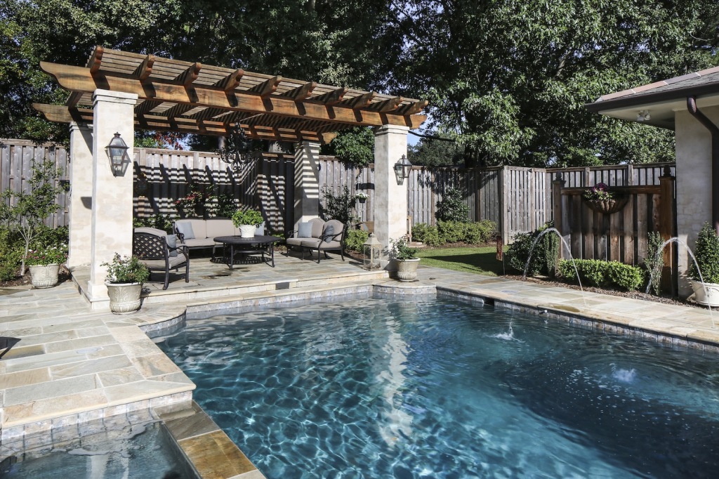 With help from Russell Pool, the Baudiers tucked a new pool into a backyard space confined on three sides by the house. Jeff built the pergola himself. 