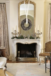 The formally appointed living room is styled as a classic parlor. The mirror and candelabra were originally part of Chretien Point Plantation in Sunset, an estate that was in Kyler’s family for generations. Photos by Melissa Oivanki.