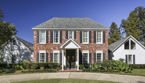 Megan and Phillip Foco's Riverbend home embodies the Colonial Revival style, with its columns and classical symmetry.