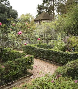 Maison Chenal’s front garden is laid out in the French parterre style, with a view of the pigeonnier beyond.