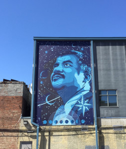 A vinyl mural of Neil deGrasse Tyson by Vance Kelly, commissioned by The Walls Project. Staff photo