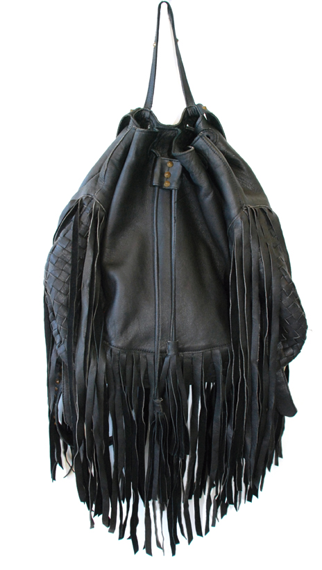 Cleobella black fringe backpack, $361, available at Hemline, shophemline.com