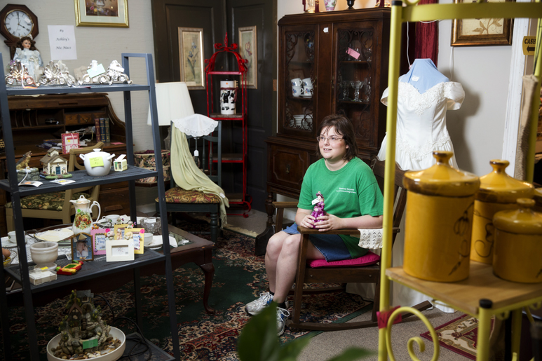 Ashley Shows in her booth, which she remodeled to resemble the Victorian Romance period.