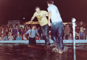 Cliff Barton and Ray Chidester competed in a log-rolling contest at the fair in 1980.