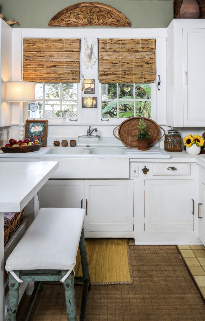 The quaint kitchen in Allan’s home features the original farmhouse sink. Not daunted by limited space, she put an island in the center of the room to serve as both prep area and eating space.