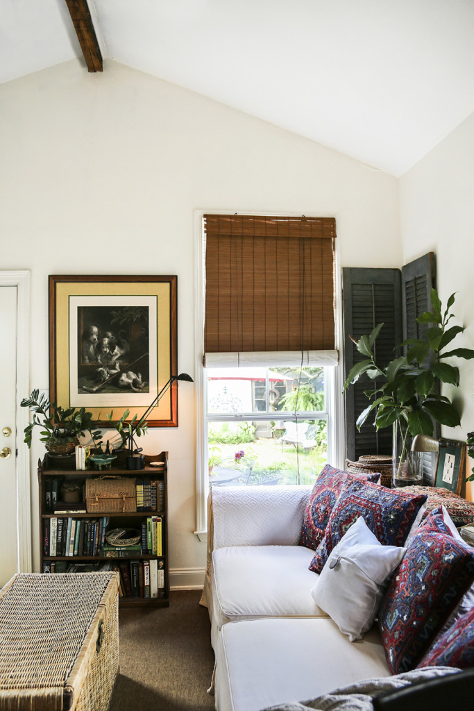 Comfortable kilim pillows add punch to the sitting area off the kitchen. 