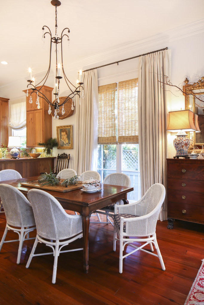 Rachel and Kirk bought their dining table and chairs from Dixon Smith Interiors nearly 30 years ago. Since this side of the house faces west and is shaded for much of the day, Rachel painted the chairs white a few years ago to brighten up the space. The table expands to seat 12 and is usually filled with family and friends at holiday time.