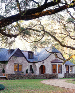 A sympathetic addition maintains the rustic Tudor charm of this cottage while doubling its size.